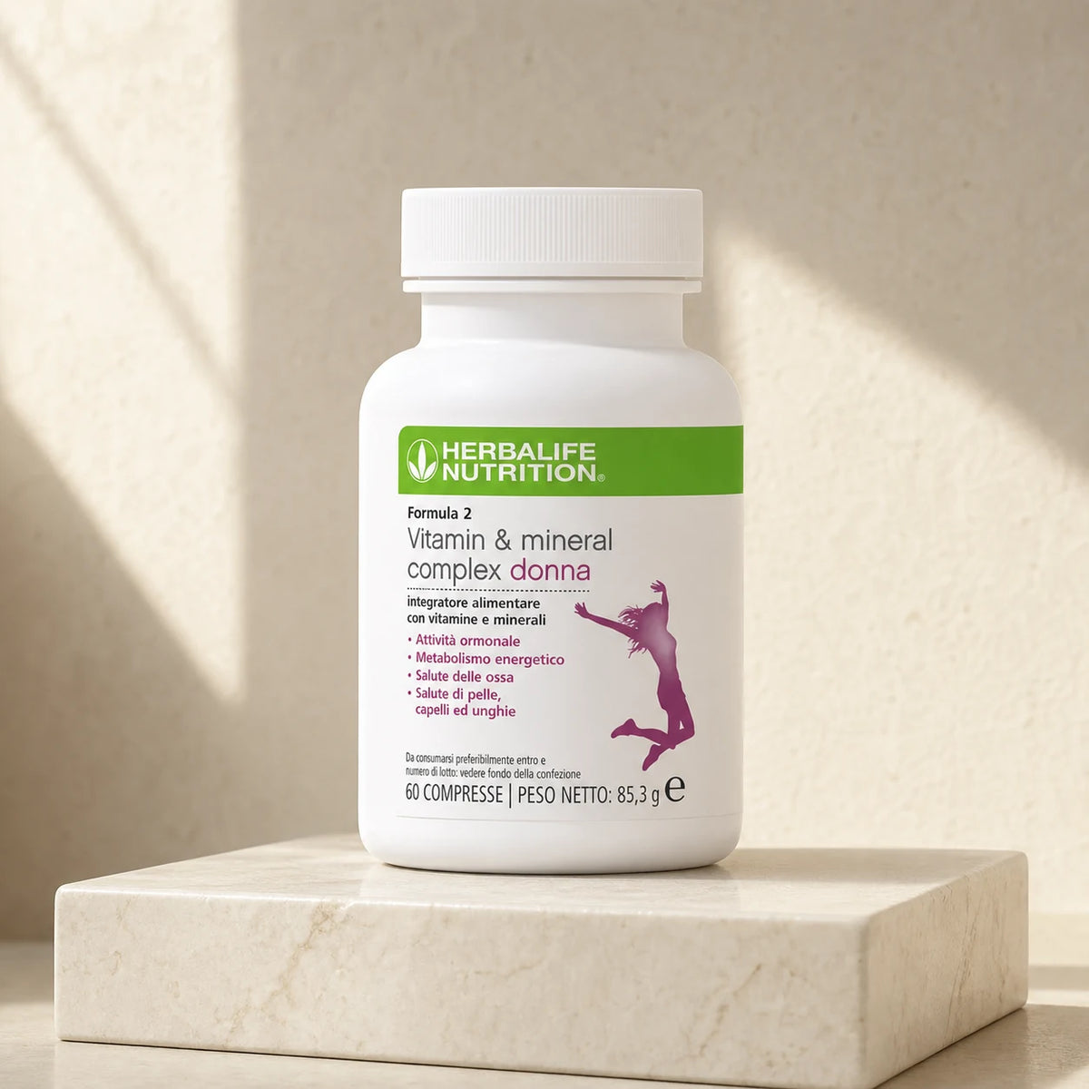 Formula 2 Vitamin & Mineral Complex Donna Herbalife su piedistallo in marmo