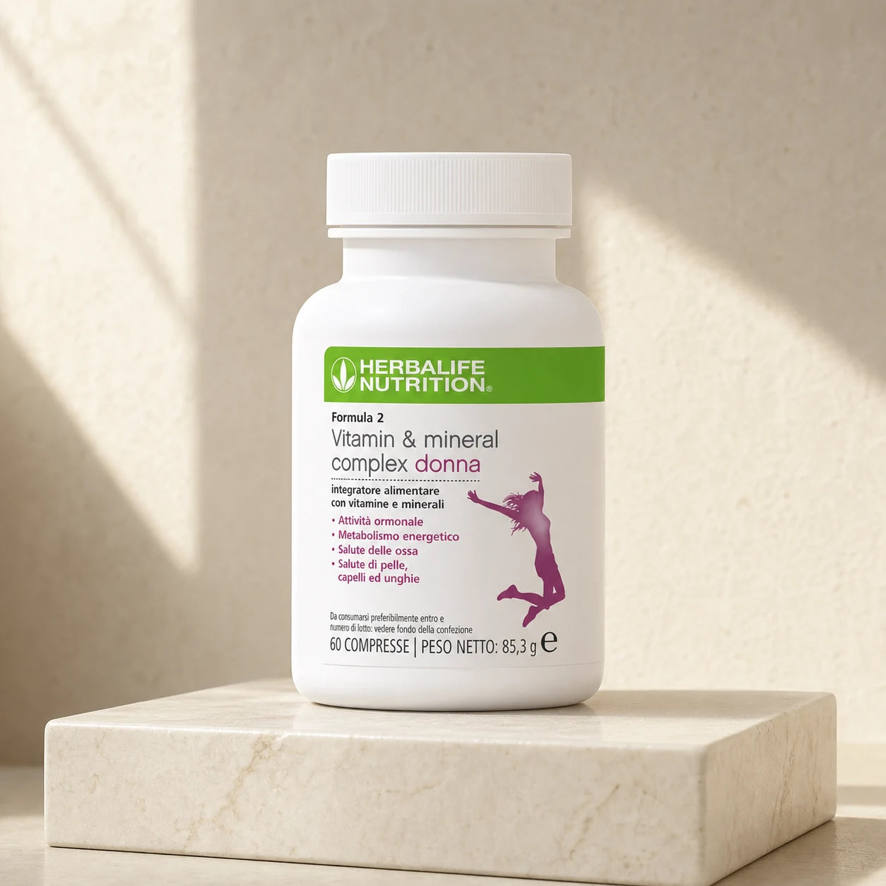 Formula 2 Vitamin & Mineral Complex Donna Herbalife su piedistallo in marmo